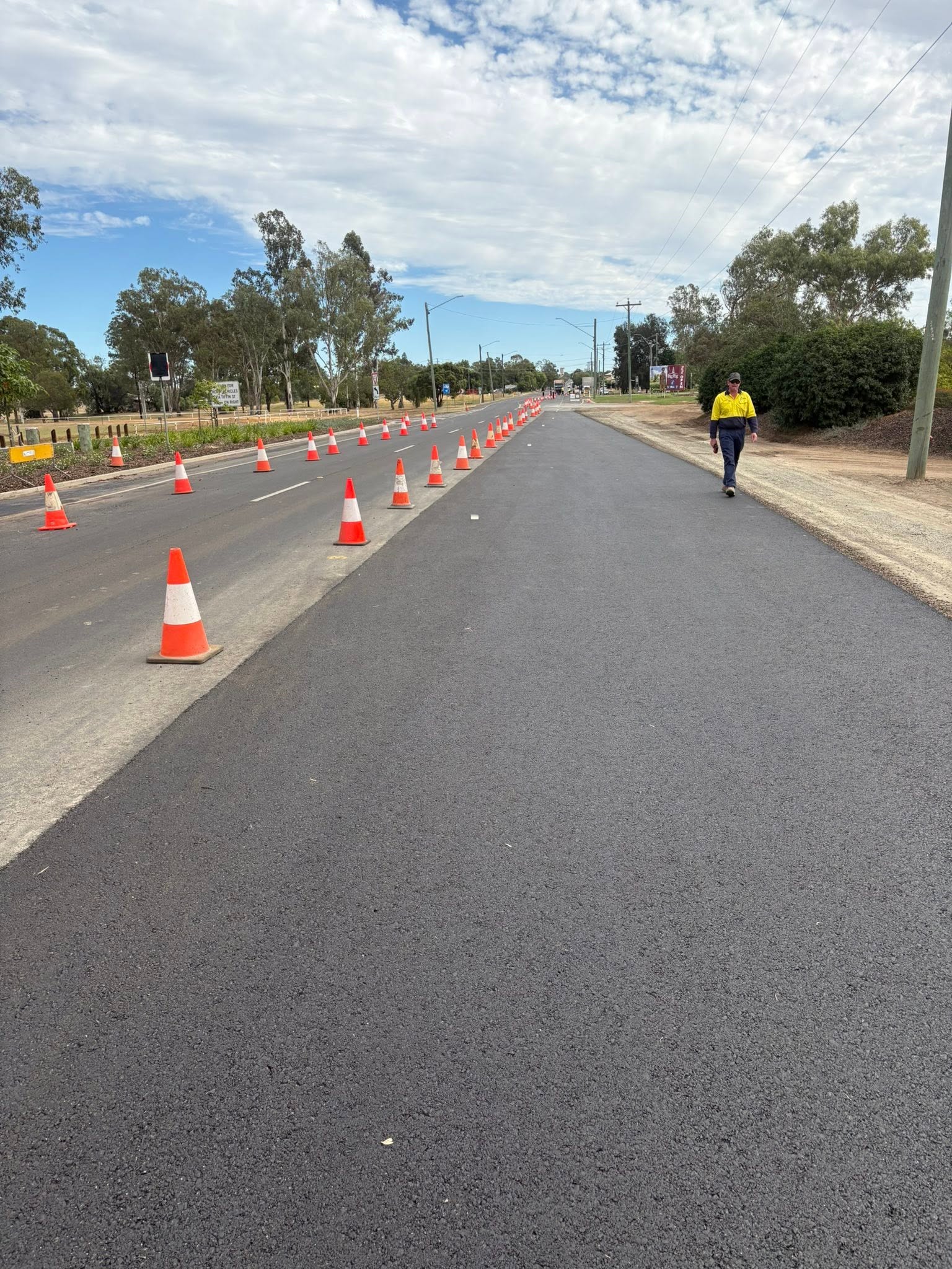Fresh asphalt road works — Dynamic Road Hire context